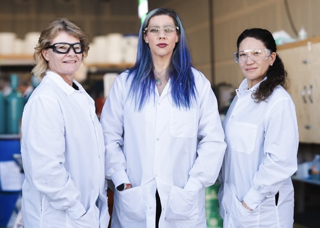 The founder of Endolith Mining, Dr. Liz Dennett, and two coworkers